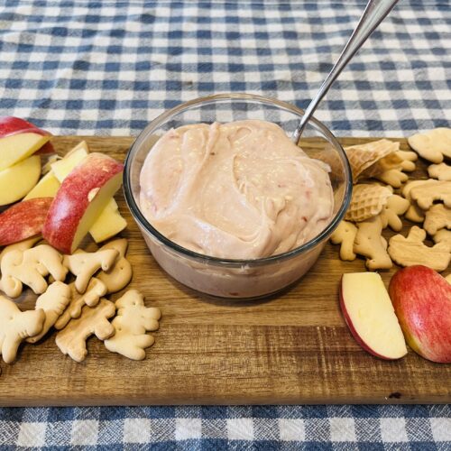 strawberry cheesecake dip on platter with dipping options