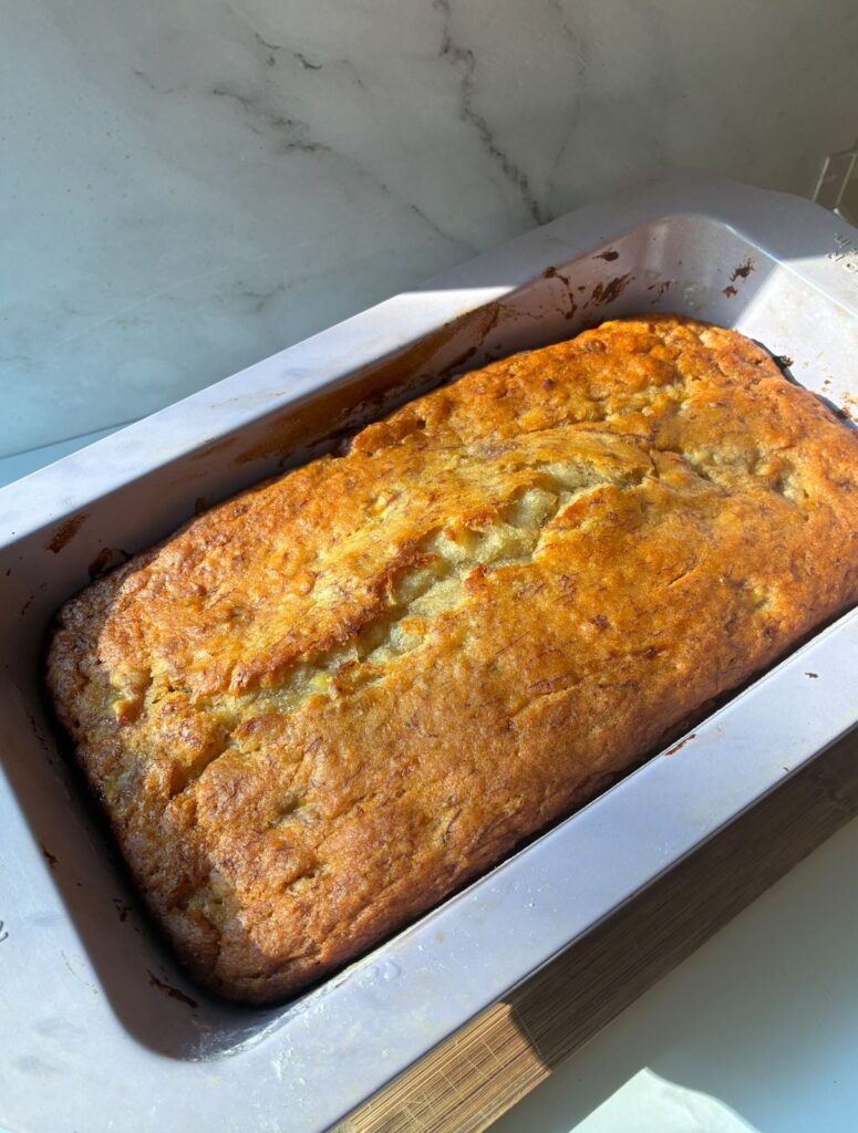 baked eggless banana bread in the baking pan