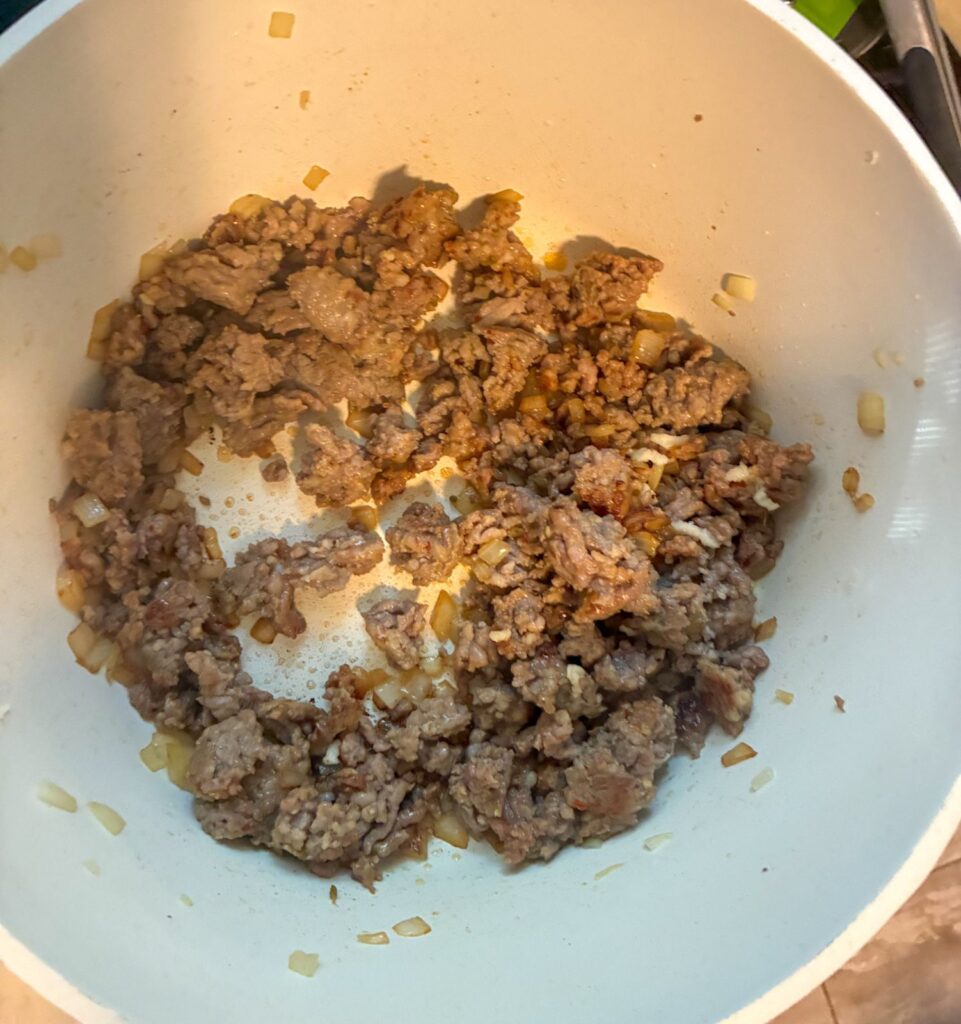 browned sausage in a large pot