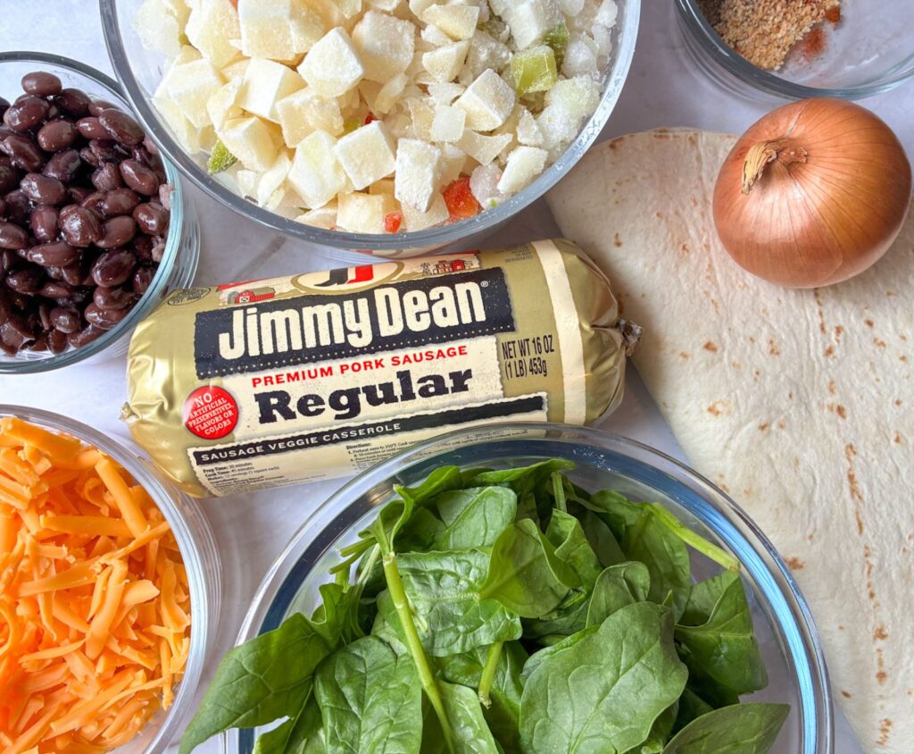 Ingredients used in eggless breakfast burritos laid out on a table