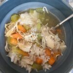 Chicken and rice soup served in bowl