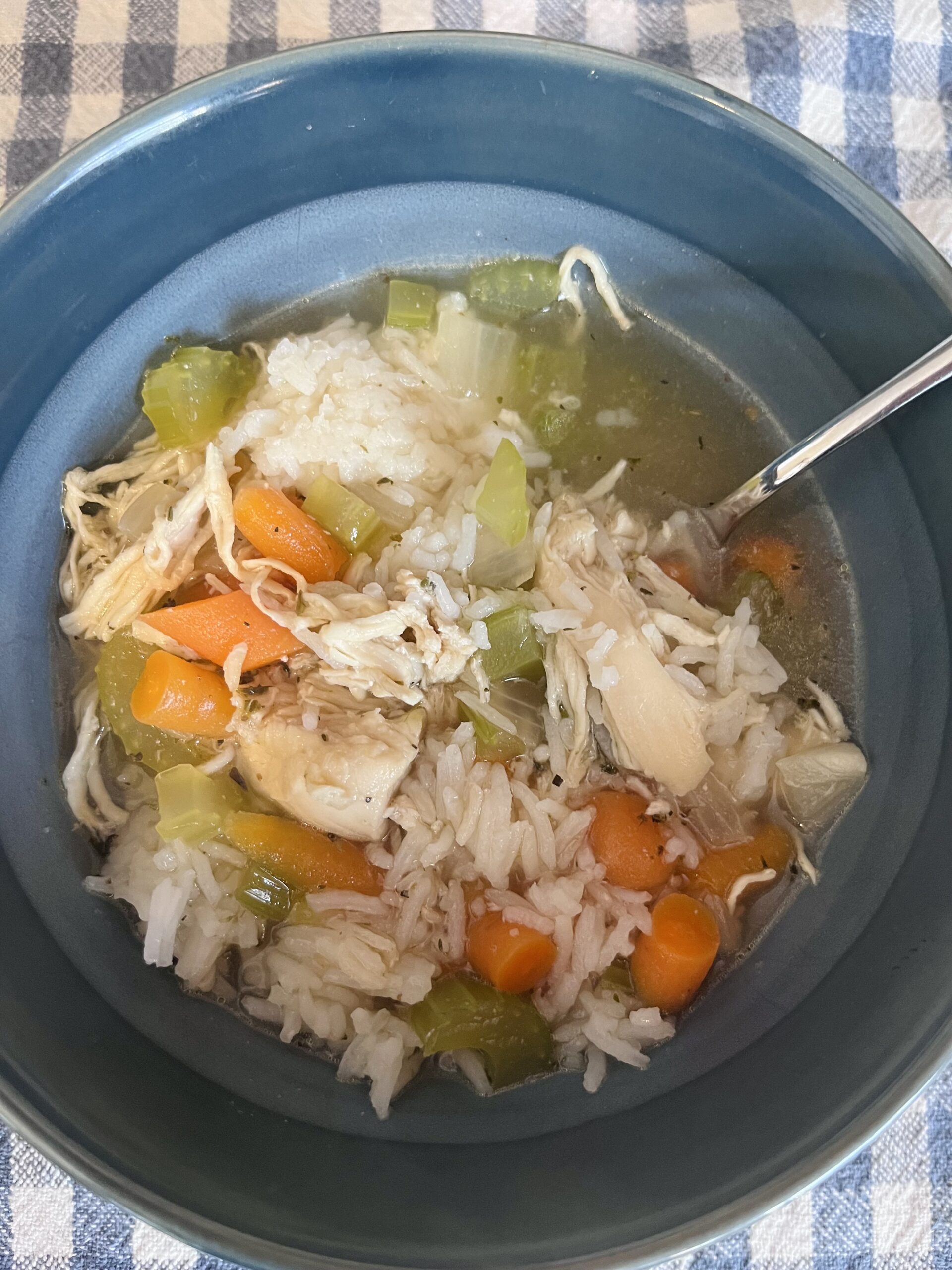 Chicken and rice soup served in bowl