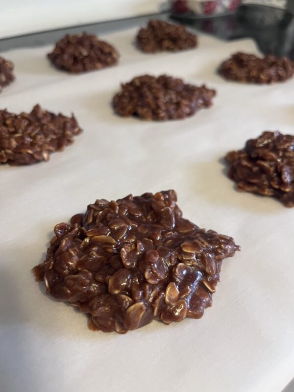 Peanut free no bake cookies drying on a cookie sheet after being prepared