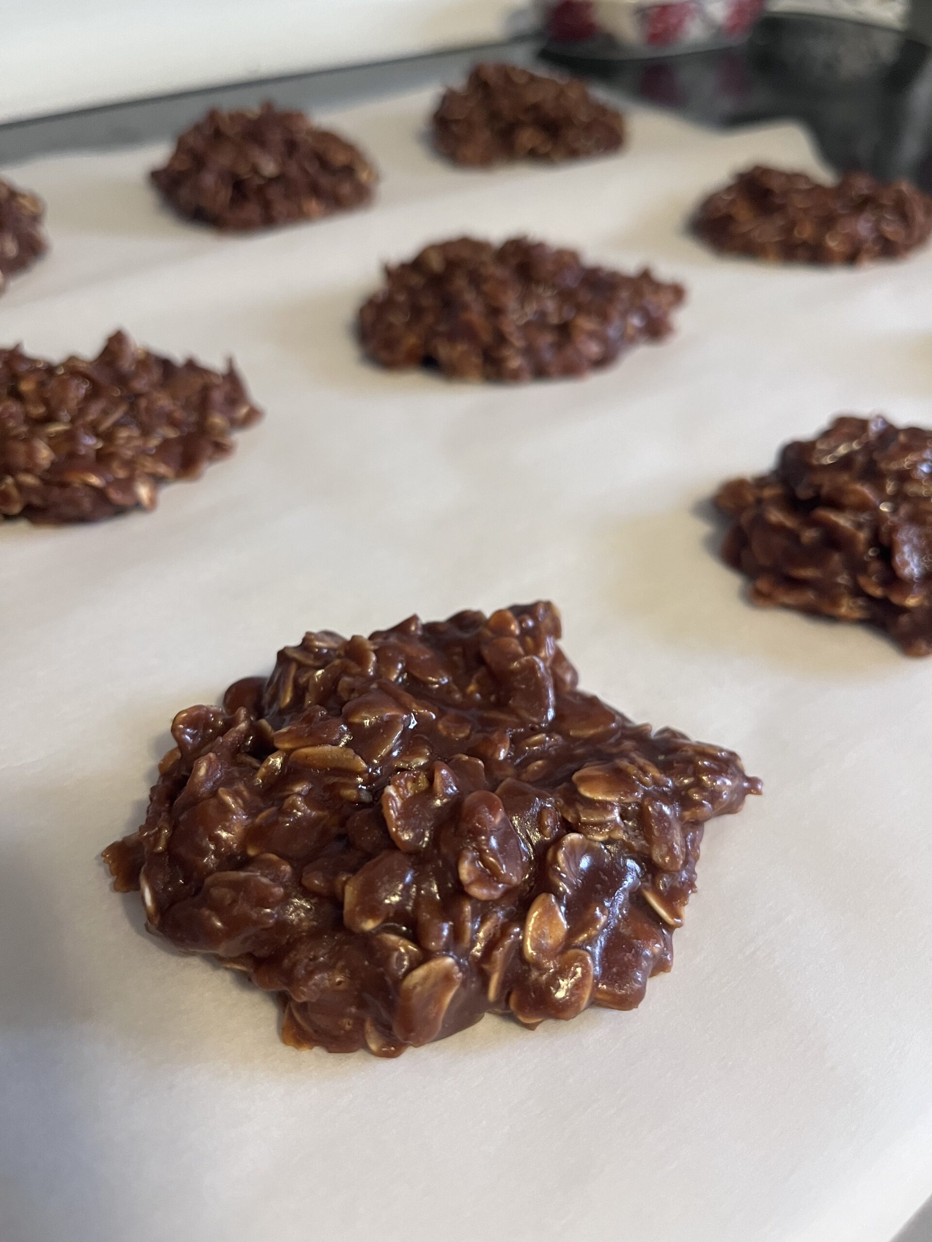 Peanut free no bake cookies drying on a cookie sheet after being prepared