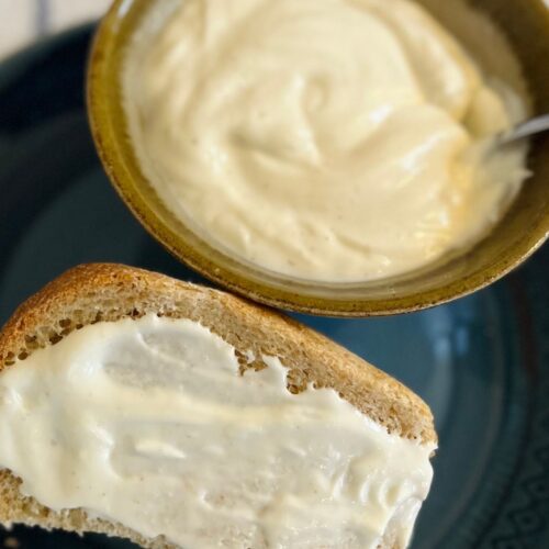 eggless mayo with a slice of bread with mayo by it