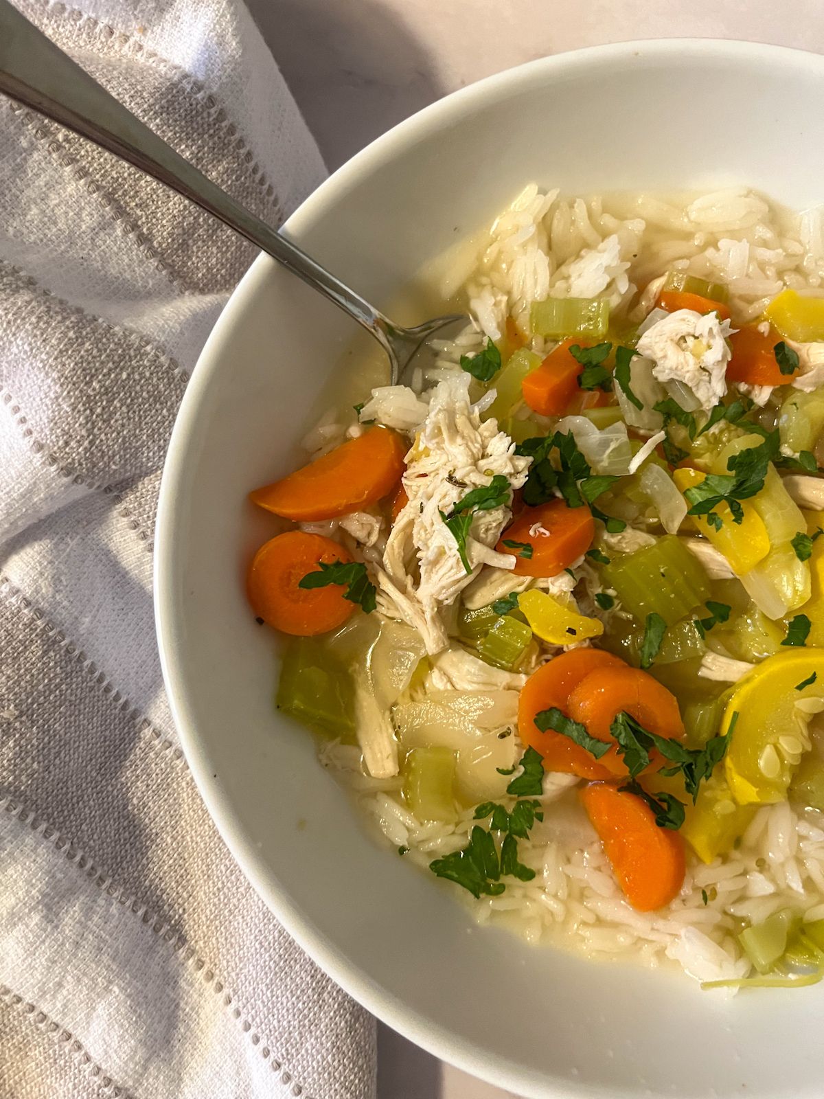 chicken and rice soup served in a bowl