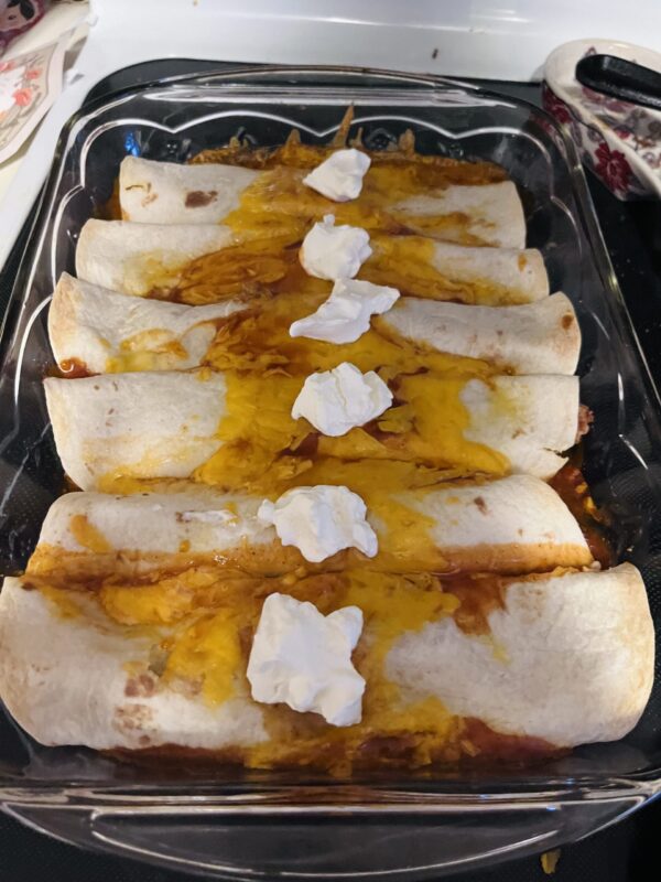 Pork enchiladas in a casserole dish