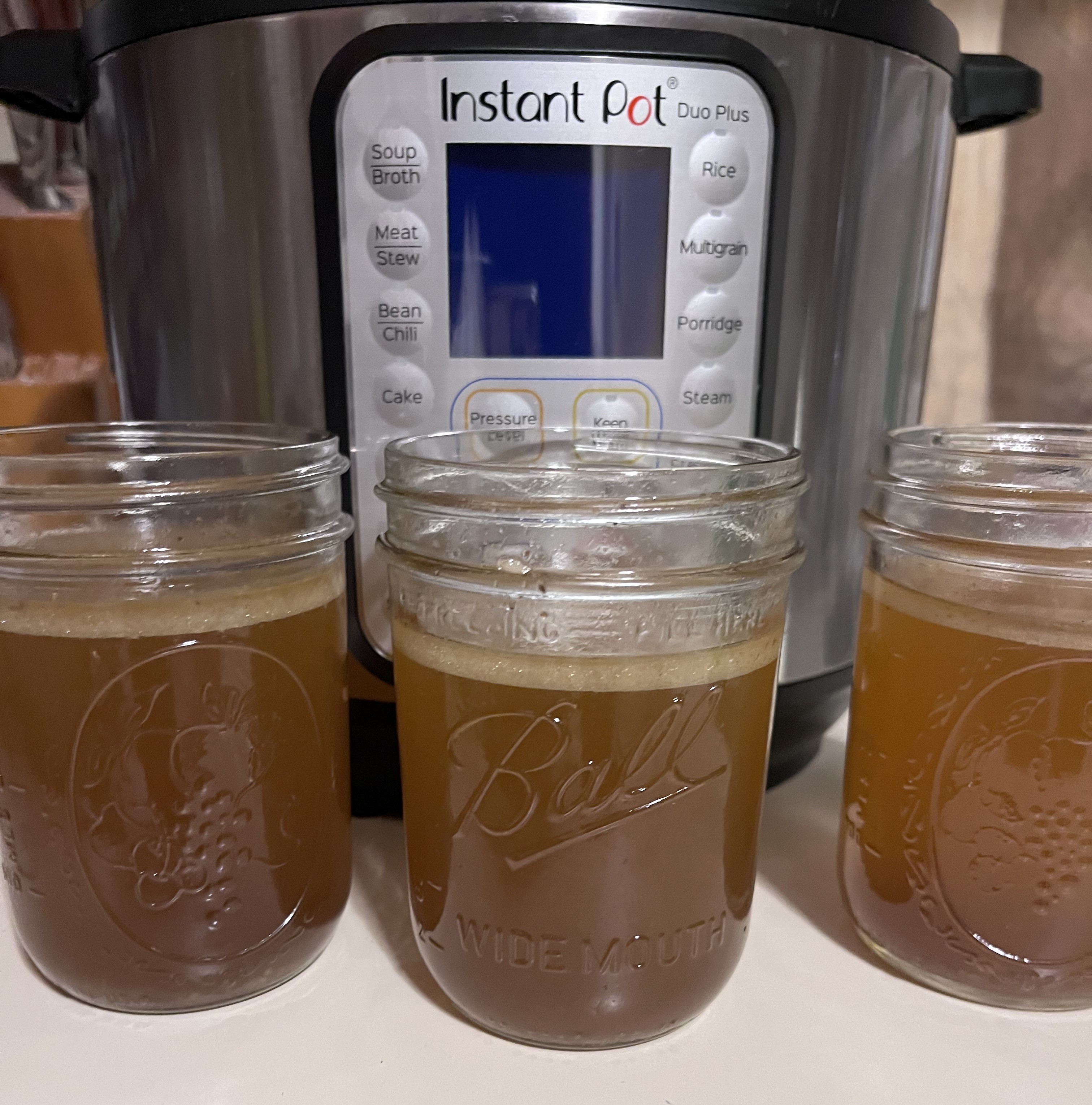 Mason jars filled with bone broth