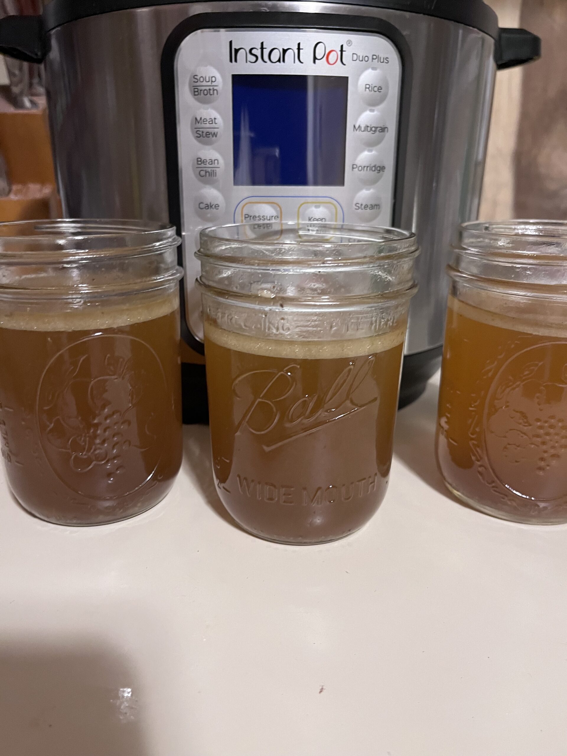 Mason Jars filled with beef bone broth