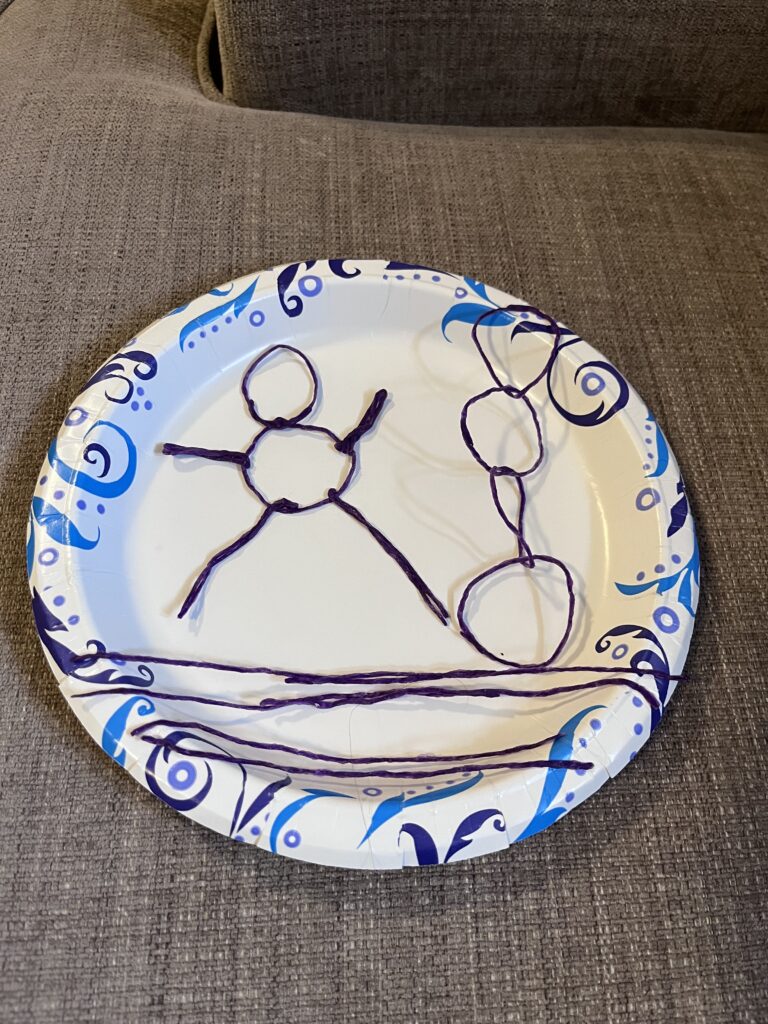 Wiki sticks on a paper plate are an easy mess free activity for kids while traveling