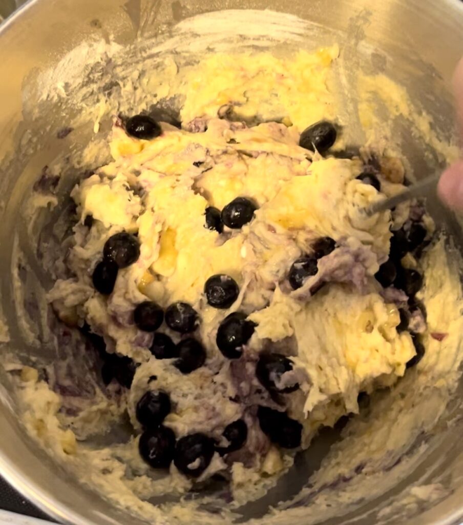 Sourdough discard banana blueberry batter mix in a bowl