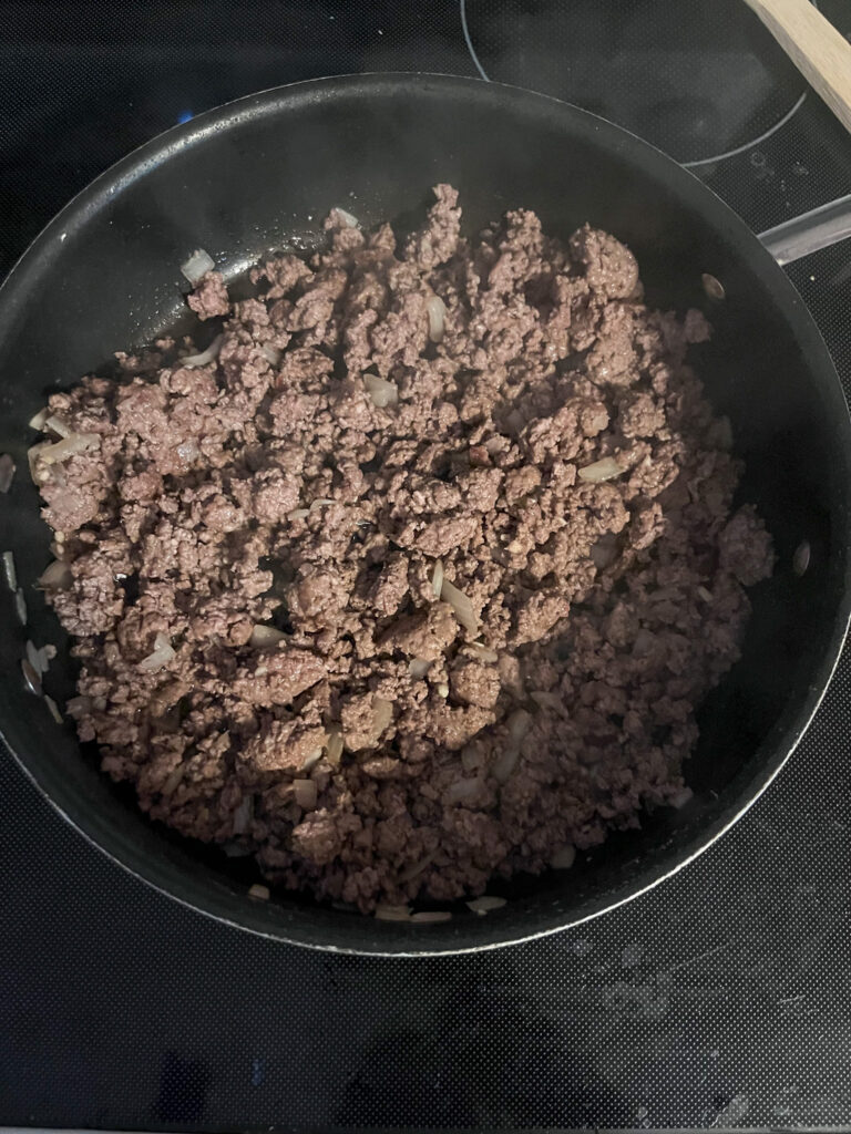 cooked ground beef in a pan