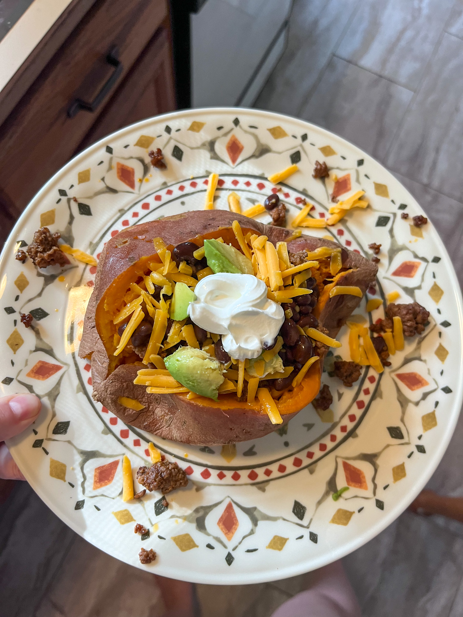 Loaded sweet potato served on a plate