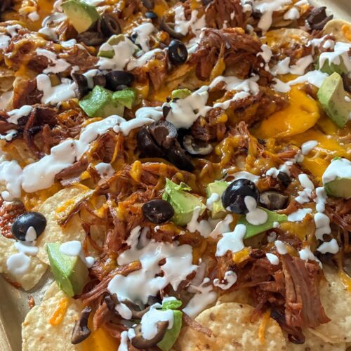 sheet pan pulled pork nachos with all the toppings