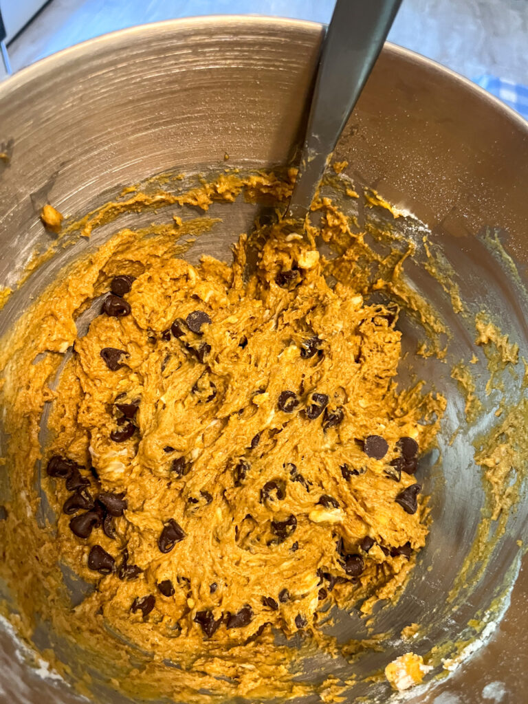 Muffin mix in large bowl ready to be placed into muffin tin