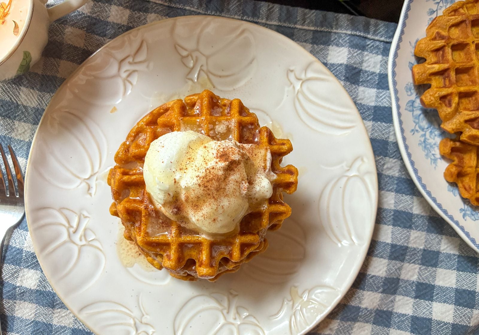 eggless pumpkin spice waffles on a table