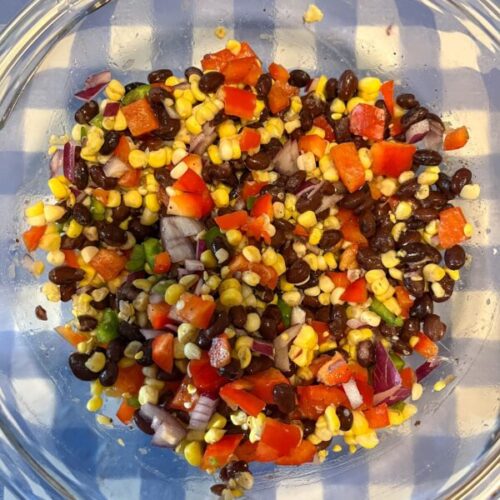 Fresh corn and black bean salsa in a large bowl