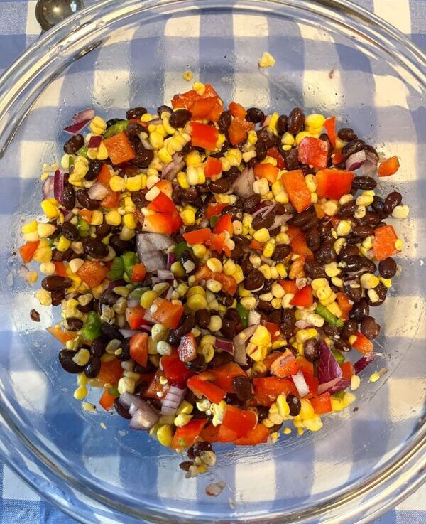 Fresh corn and black bean salsa in a large bowl