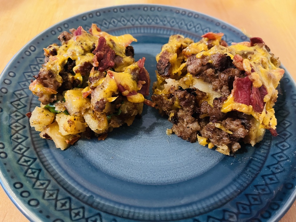 breakfast casserole without eggs sliced and served on a plate