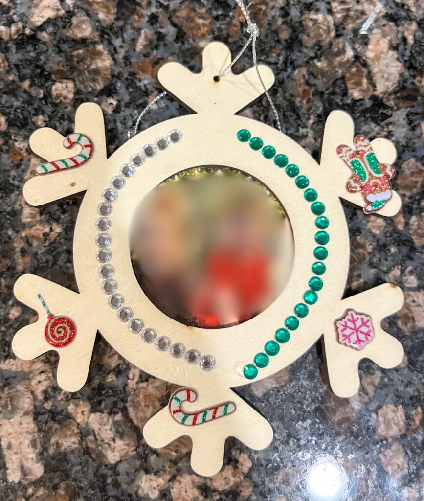 homemade ornament covered in colored gems