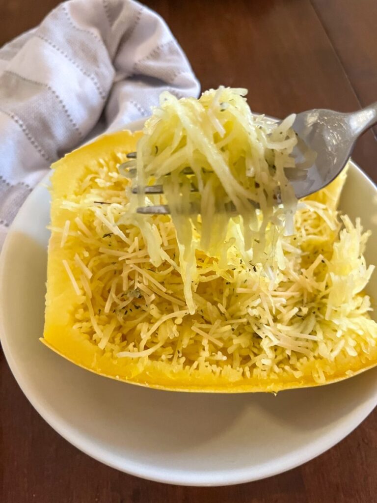 spaghetti squash with strands wrapped around a fork