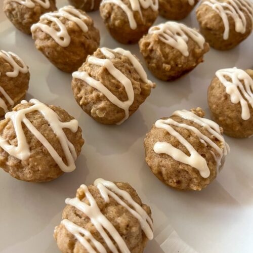 applesauce muffins without glaze displayed on a plate