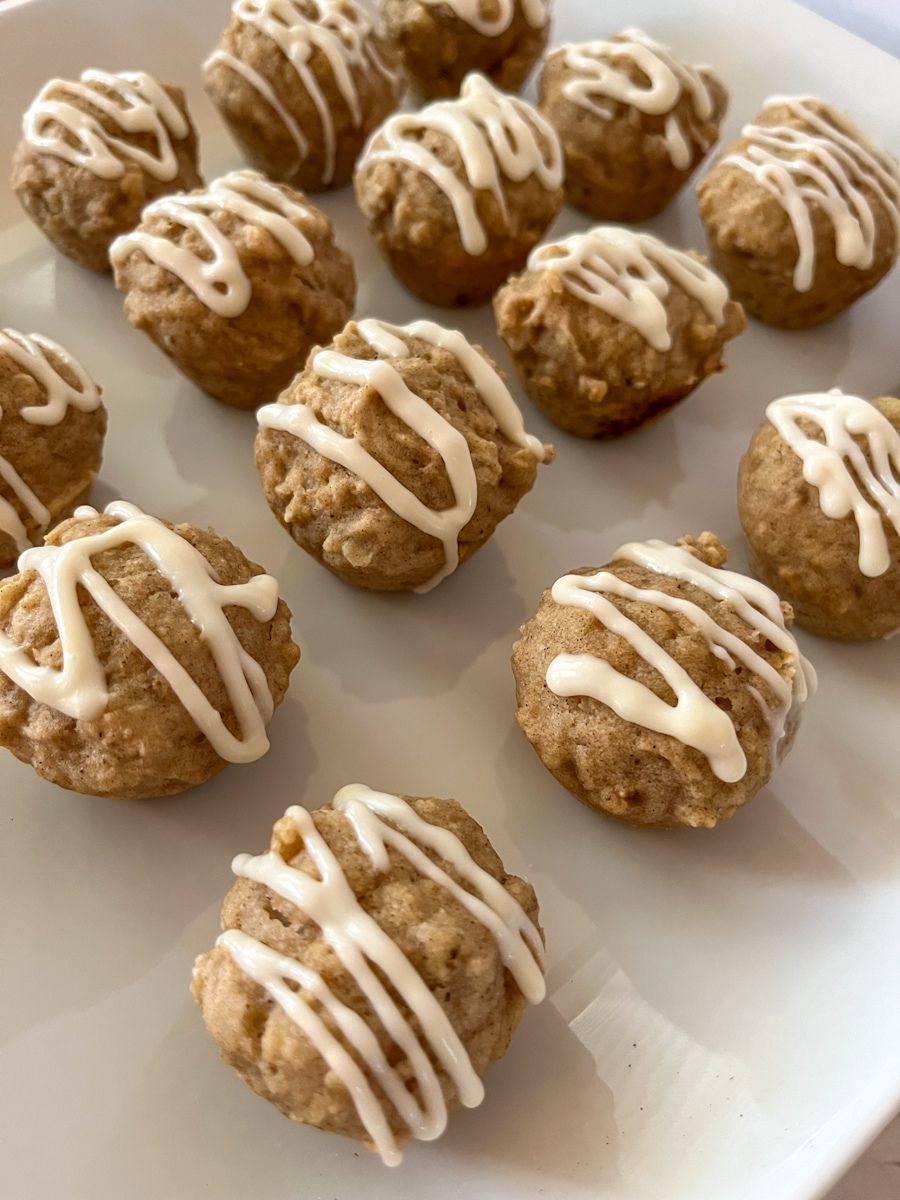 applesauce muffins without glaze displayed on a plate