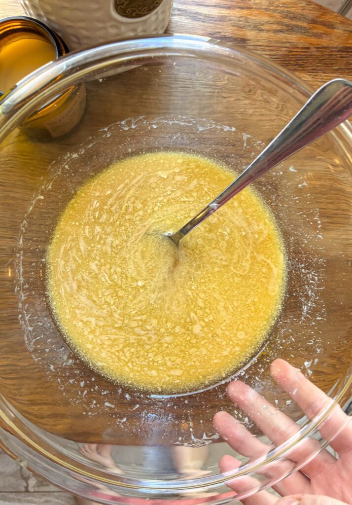 Melted butter and sugars in a large bowl