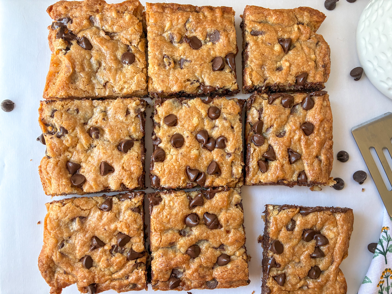 eggless chocolate chip cookie bars sliced into 9 squares