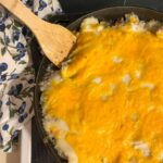 shepherds pie with instant potatoes served in a large cast iron skillet