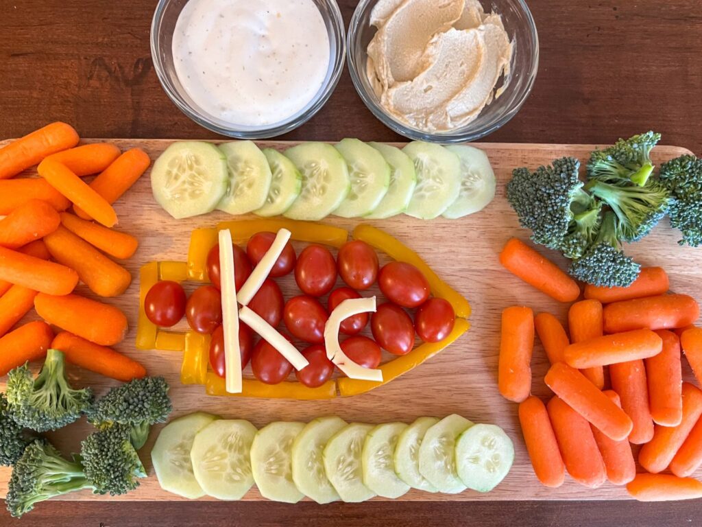 Vegetable platter with 2 dipping sauces. 