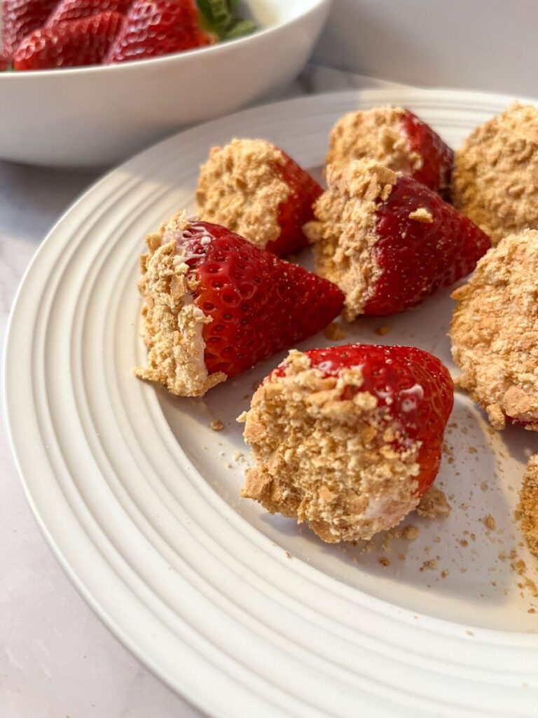 stuffed strawberries fanned out on a plate to serve