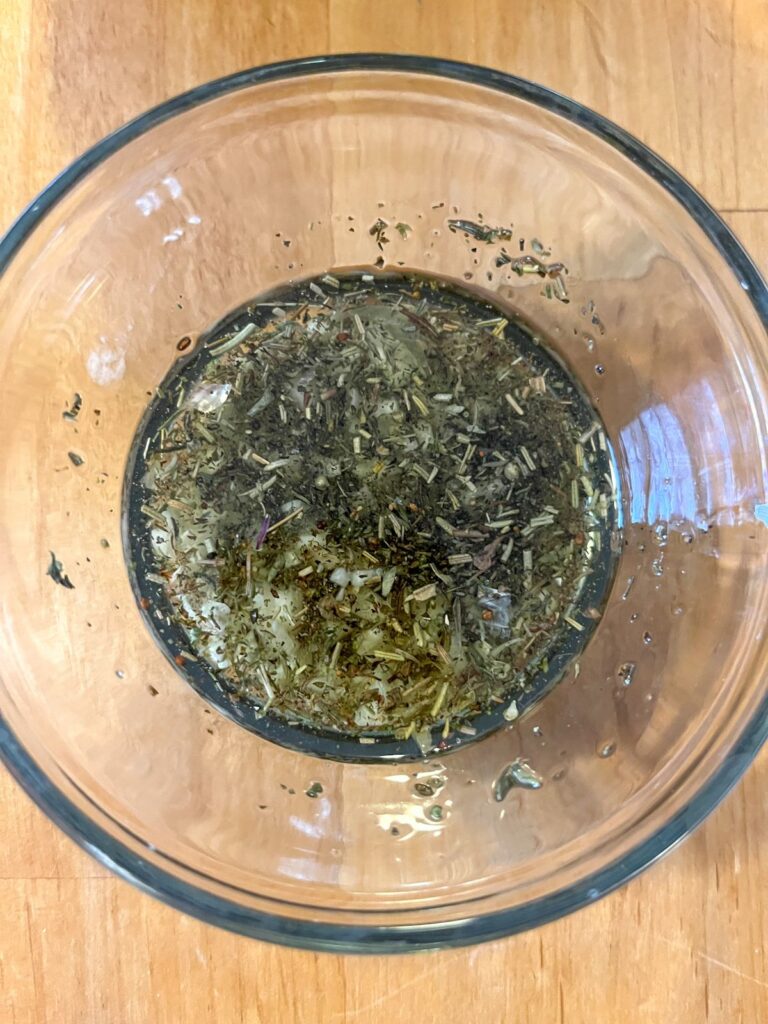 Oil and seasonings for Italian roasted vegetables mixed together