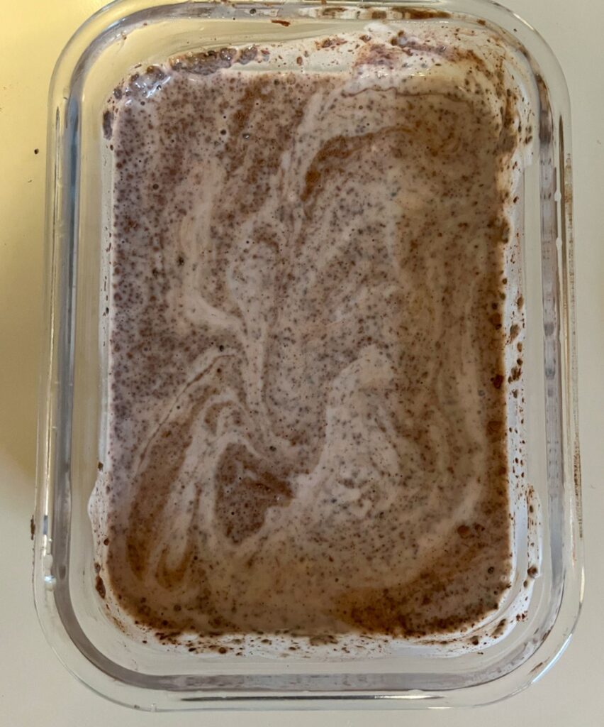 Chocolate chia seed pudding mixed together in a bowl