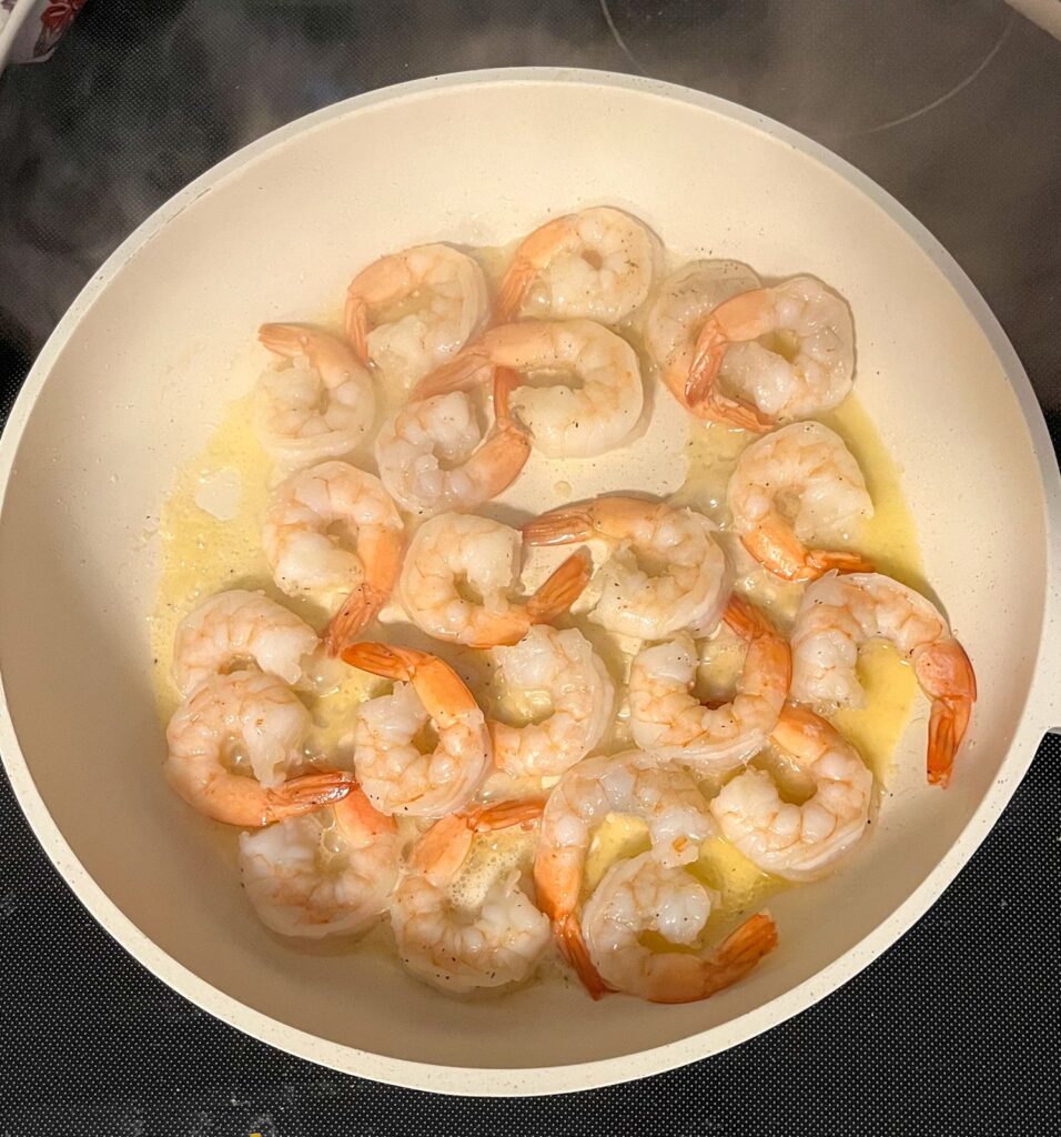 shrimp in a sauce pan after being sauteed