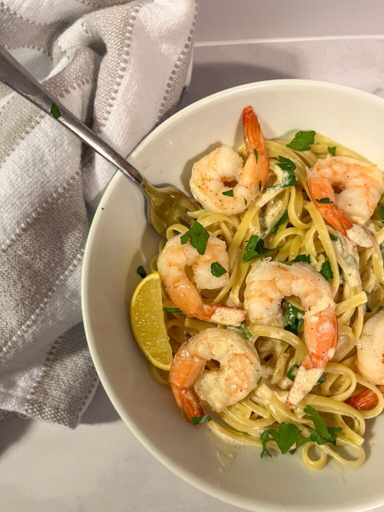 creamy lemon shrimp pasta served in a bowl