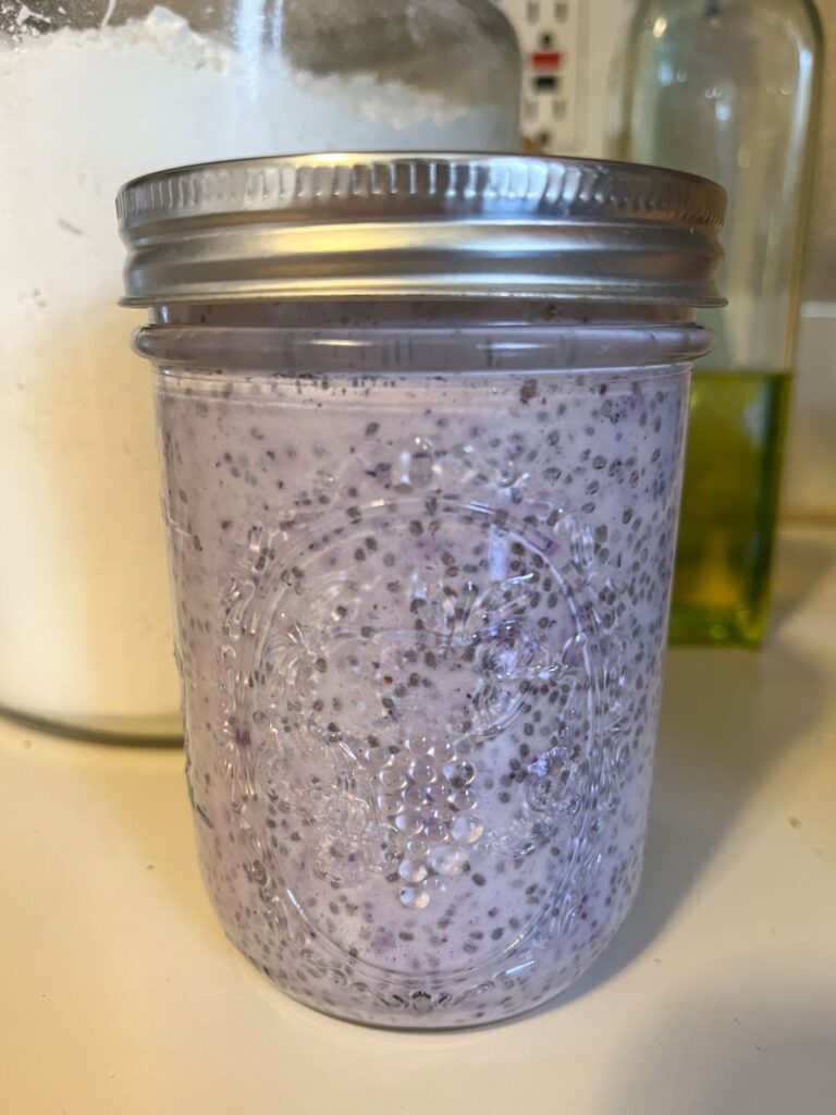 Berry chia seed pudding after it has been refrigerated for 4 hours.