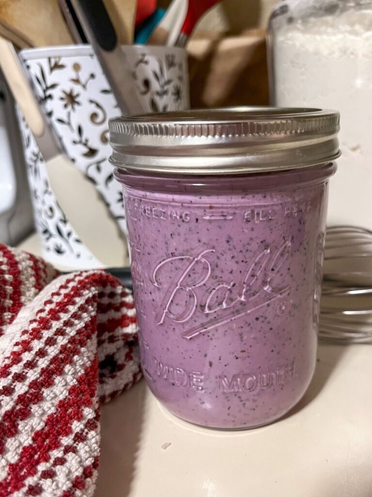 Berry chia seed pudding in a small mason jar