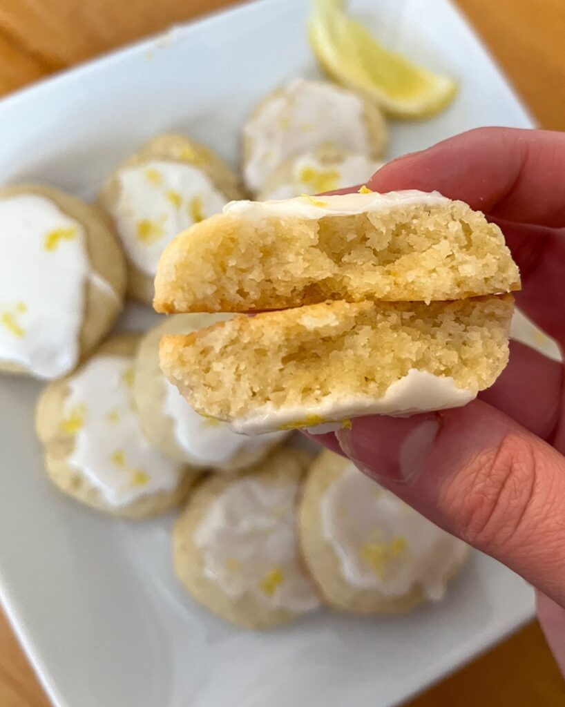 A lemon cookie broken in half to look at the inside