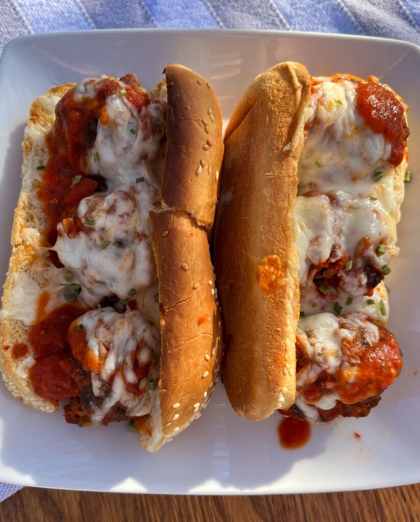 finished meatball subs without eggs on a plate