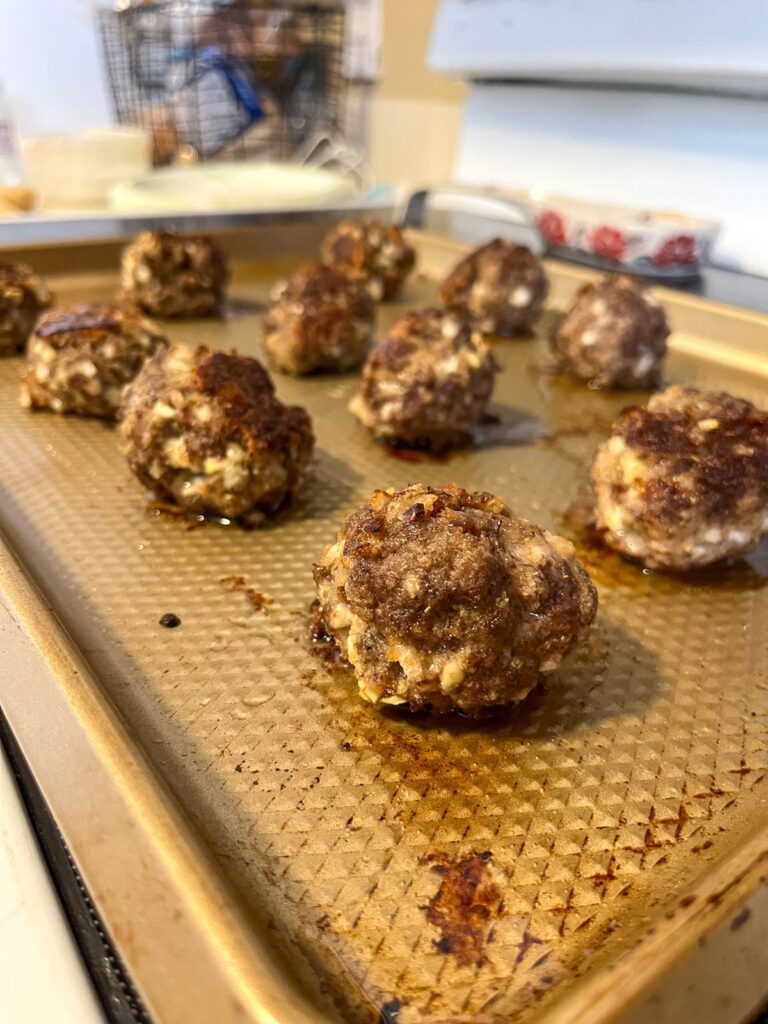 Eggless Meatballs on a baking sheet after they have been cooked