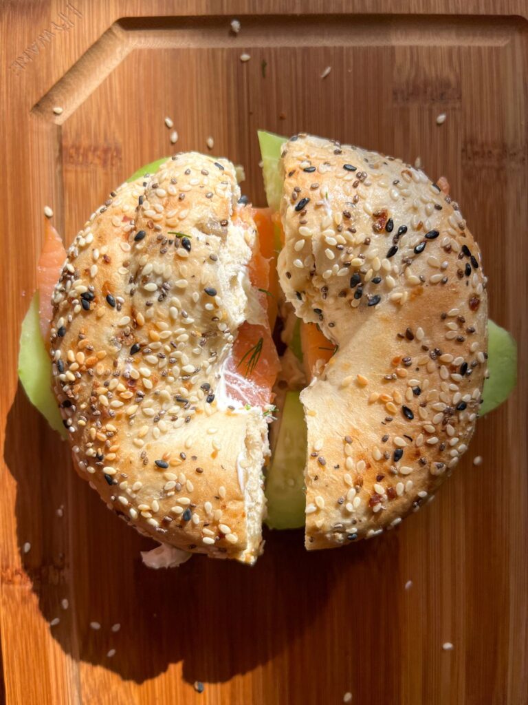 Smoked salmon bagel sliced in half