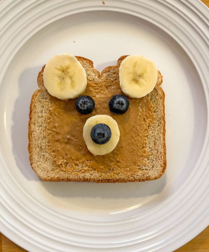 Piece of toast decorated as a bear face