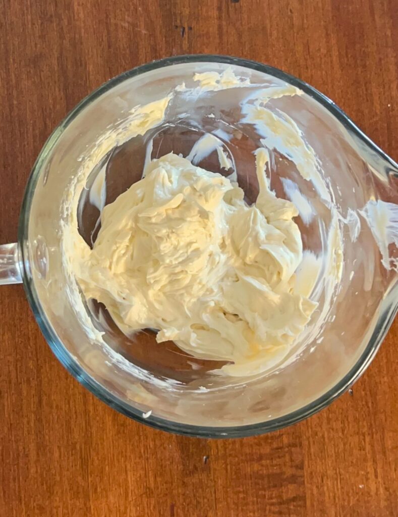 Cream cheese frosting in a bowl 