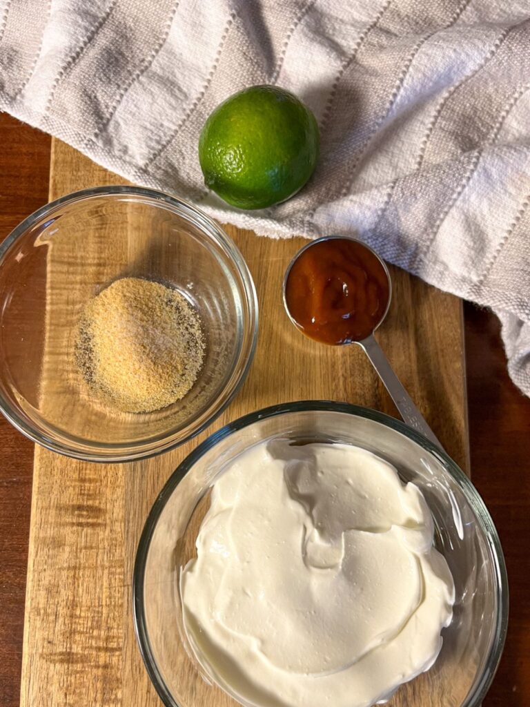 Ingredient shot. All ingredients in small bowls on a cutting board.