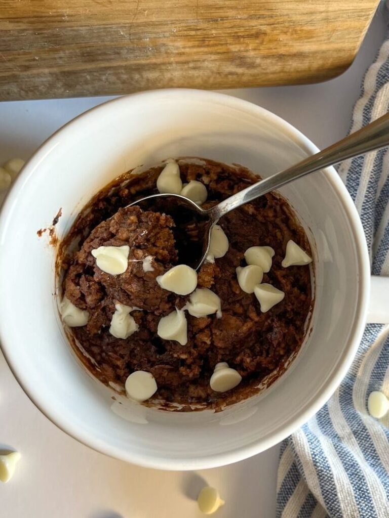 chocolate mug cake served with a spoon
