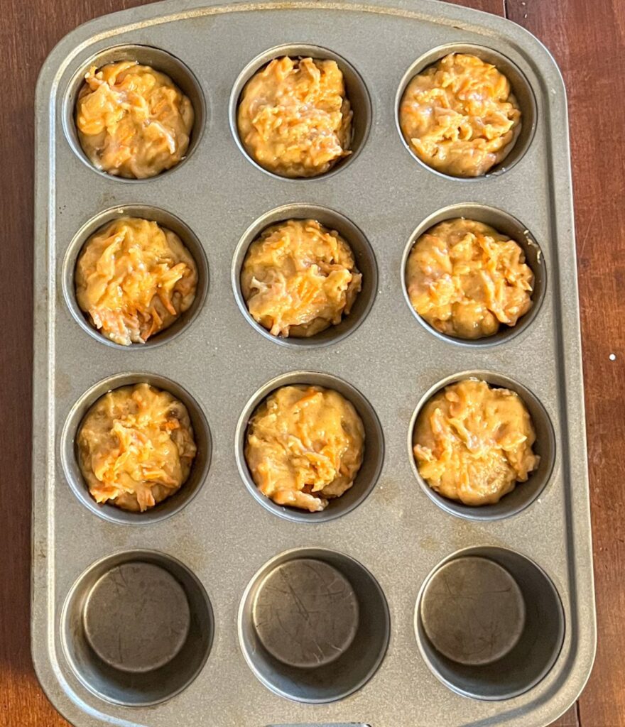 Eggless muffin tin full of batter
