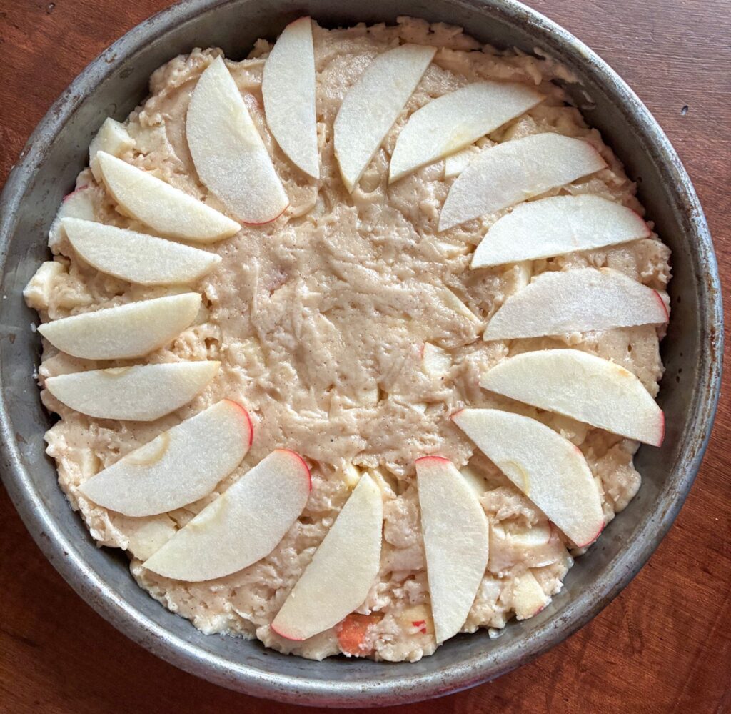 Eggless Apple cake in a pan before baking