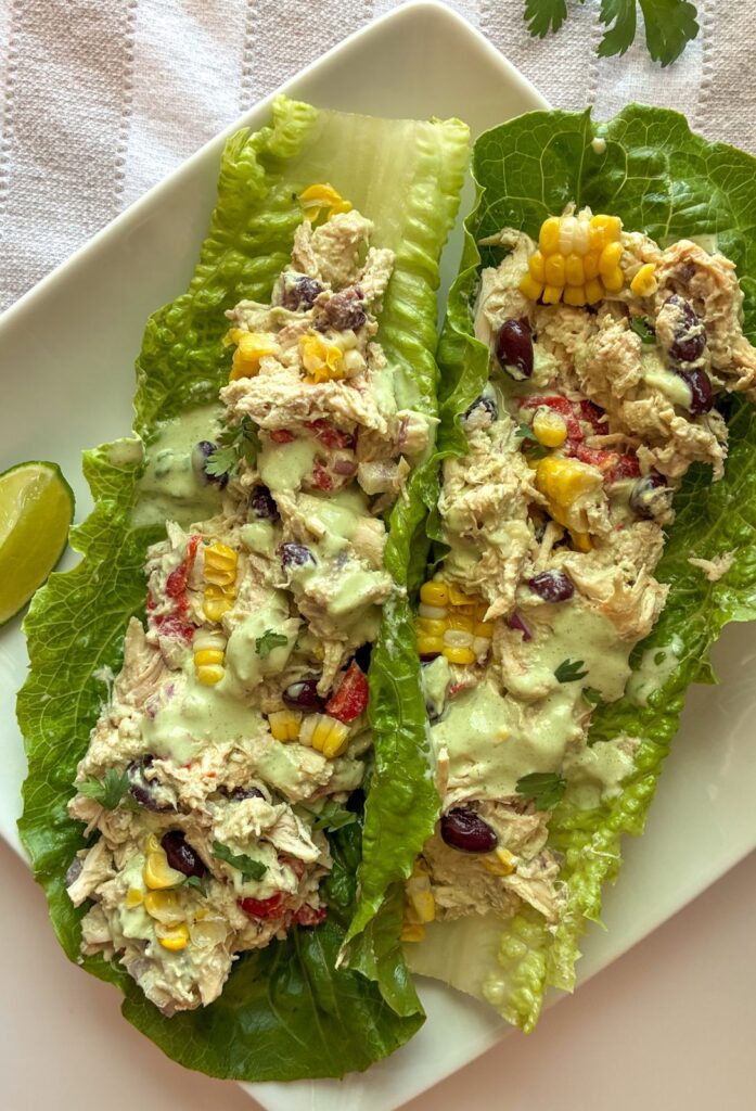 southwest chicken salad in two lettuce wraps