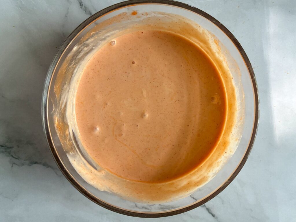 Buffalo sauce in a bowl